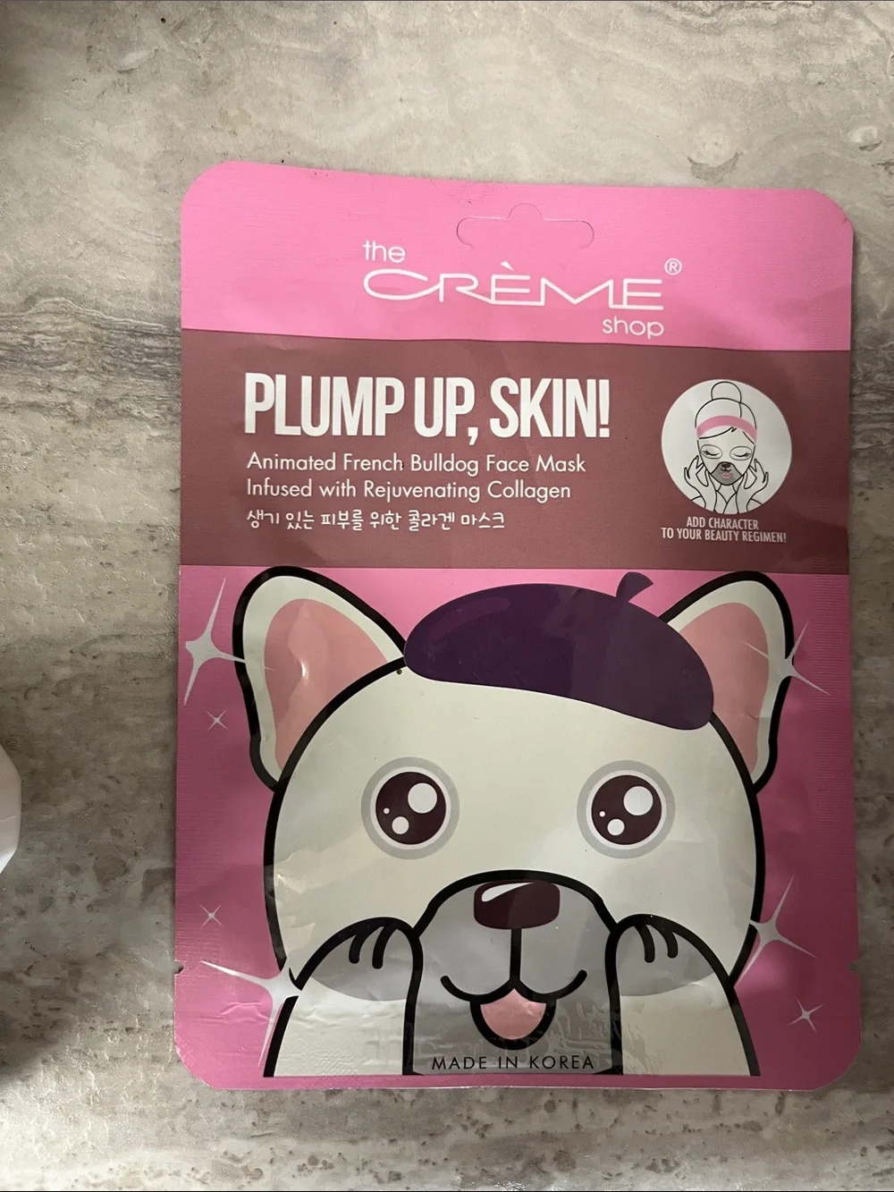 the CRÈME shop Plump Up, Skin! Pink Bulldog Face Mask